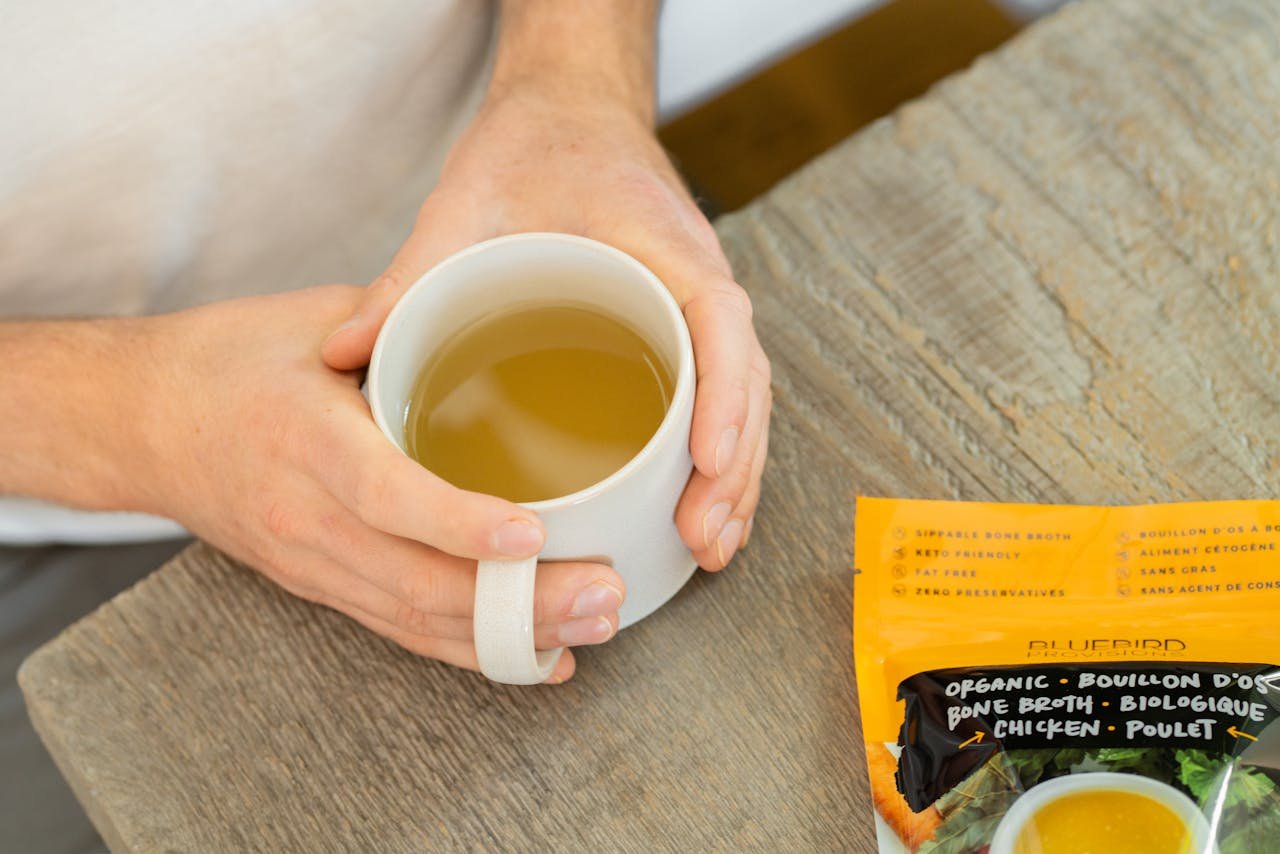 Person Holding a Mug